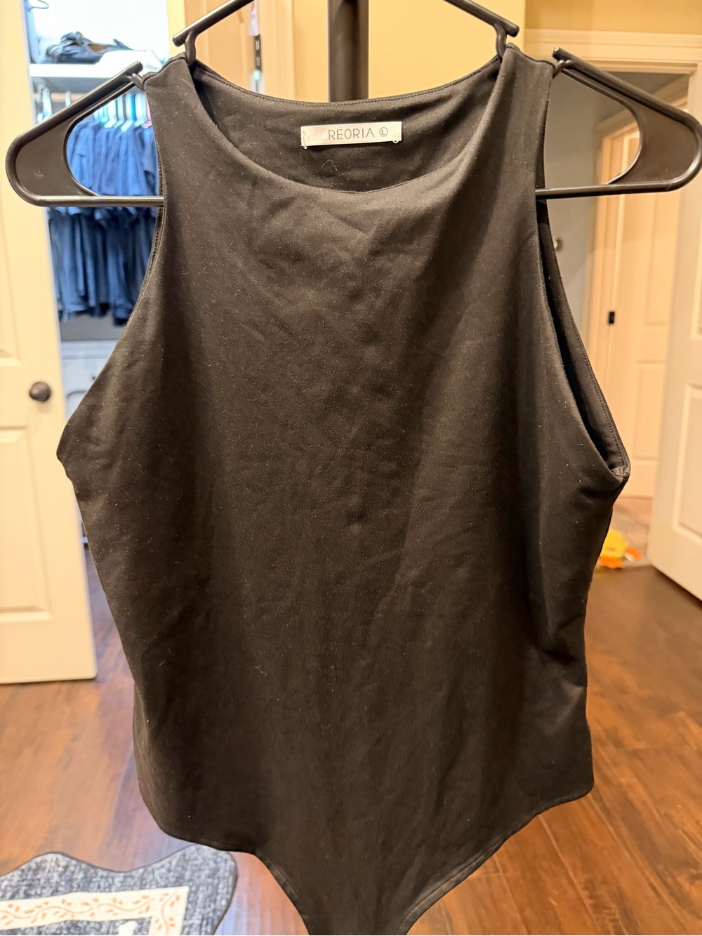 Amazon Black Sleeveless High-Neck Bodysuit